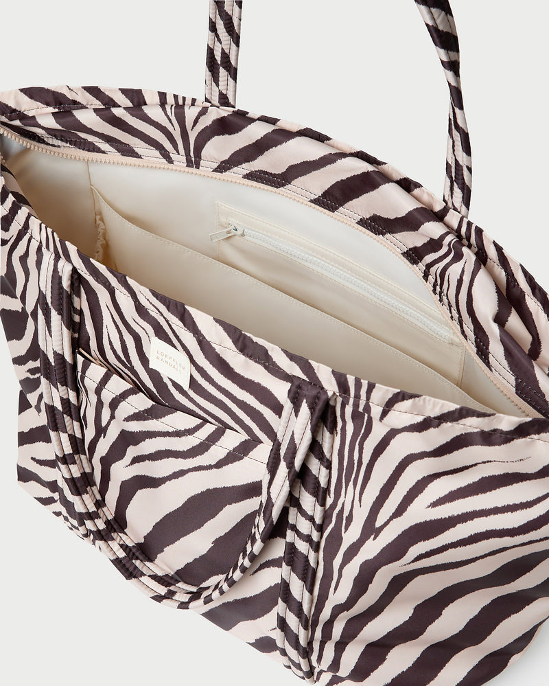 Dina Zebra Travel Tote in zebra print nylon.