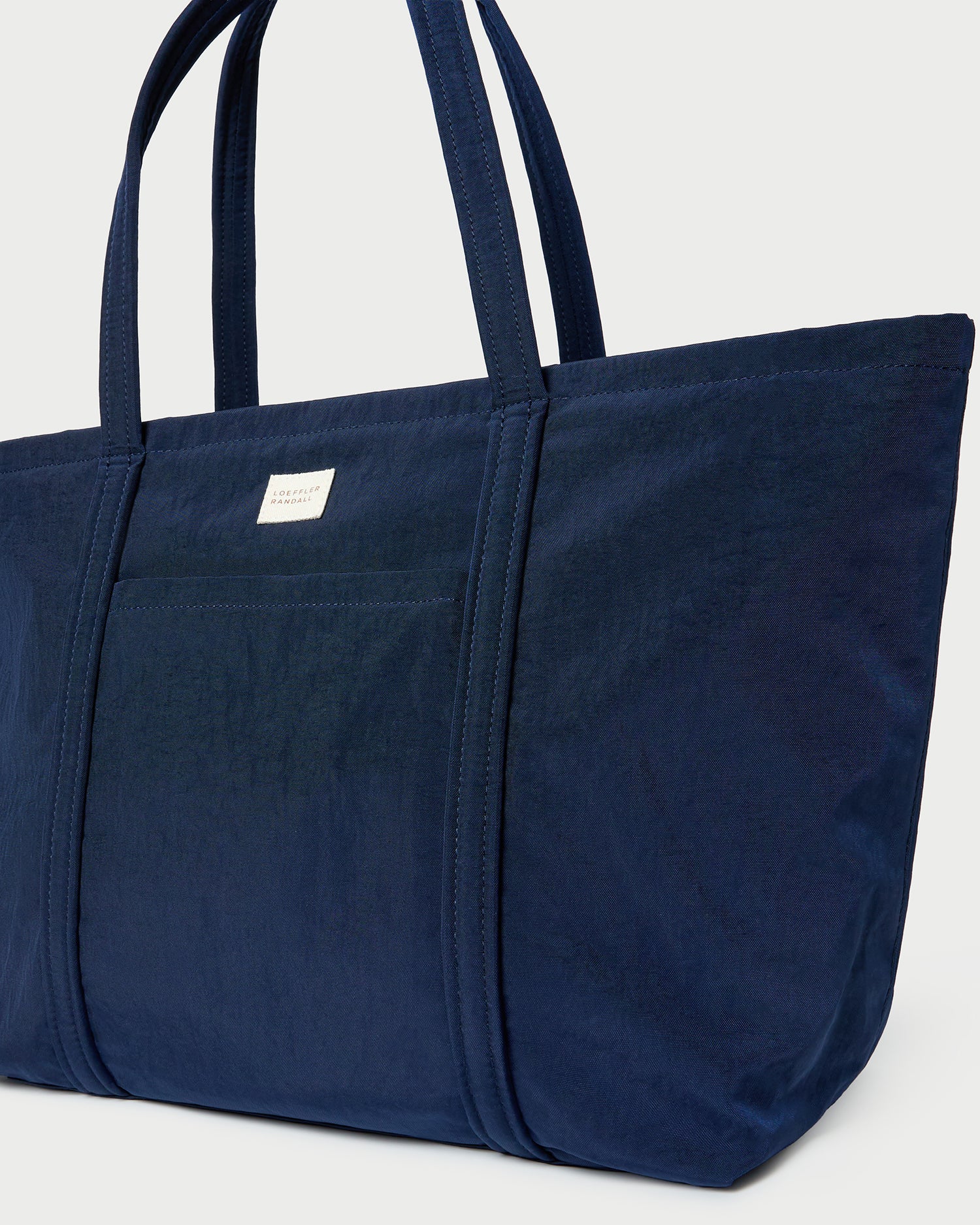 blue travel tote bag Carry All Quilted Puffer Introducing our newest tote Travelpro VersaPack+ UnderSeat Tote -