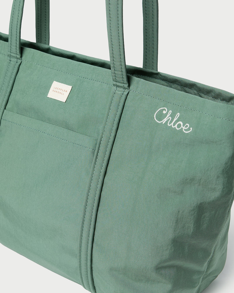 Dina Sage Travel Tote in sage green nylon.