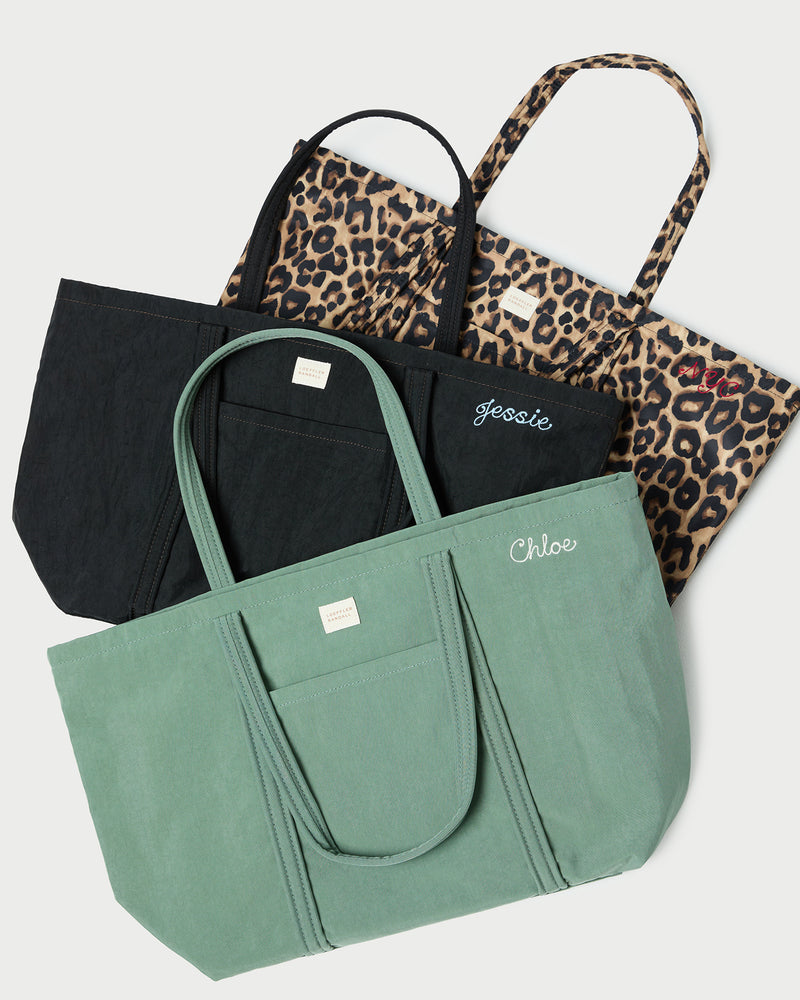 Dina Brown/Black Check Travel Tote, Dina Sage Travel Tote, and Dina Black Travel Tote.