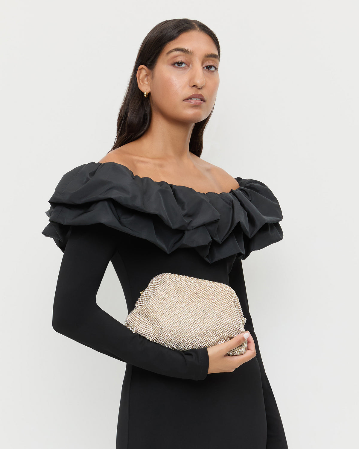 Doreen Gold Diamanté Frame Pouch in gold diamanté mesh and Suki Dress in black jersey.