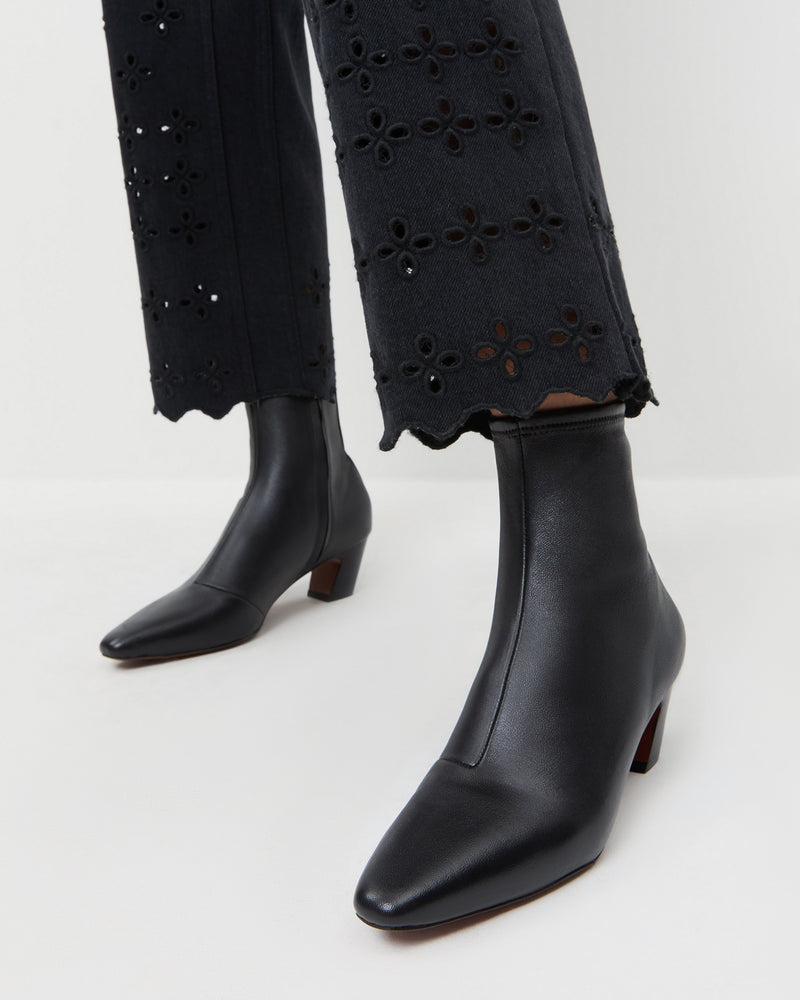 Doria Black Leather Ankle Boot in black leather and Demi Embroidered Pant in Black.