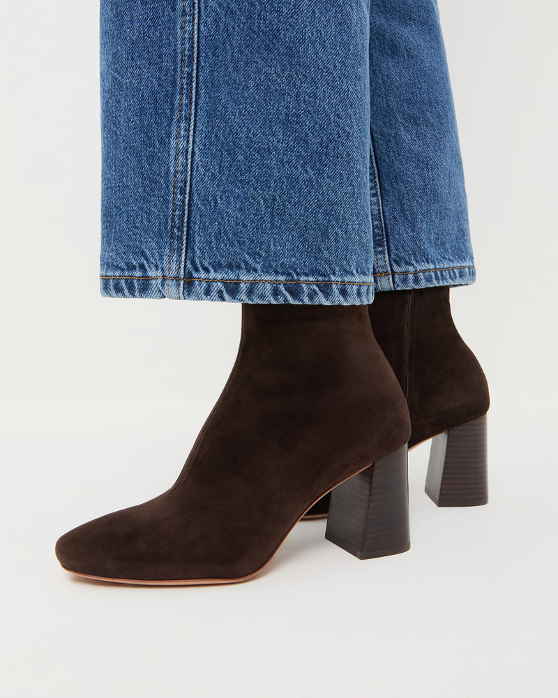 Elise Brown Suede Stretch Bootie in brown suede and Molly Workwear Jean in medium washed blue denim.