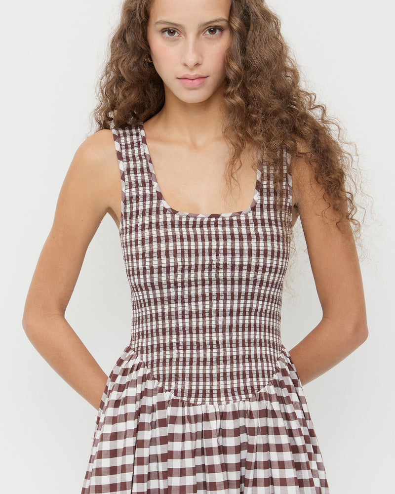 Estelle Dress in a sleeveless brown gingham cotton.