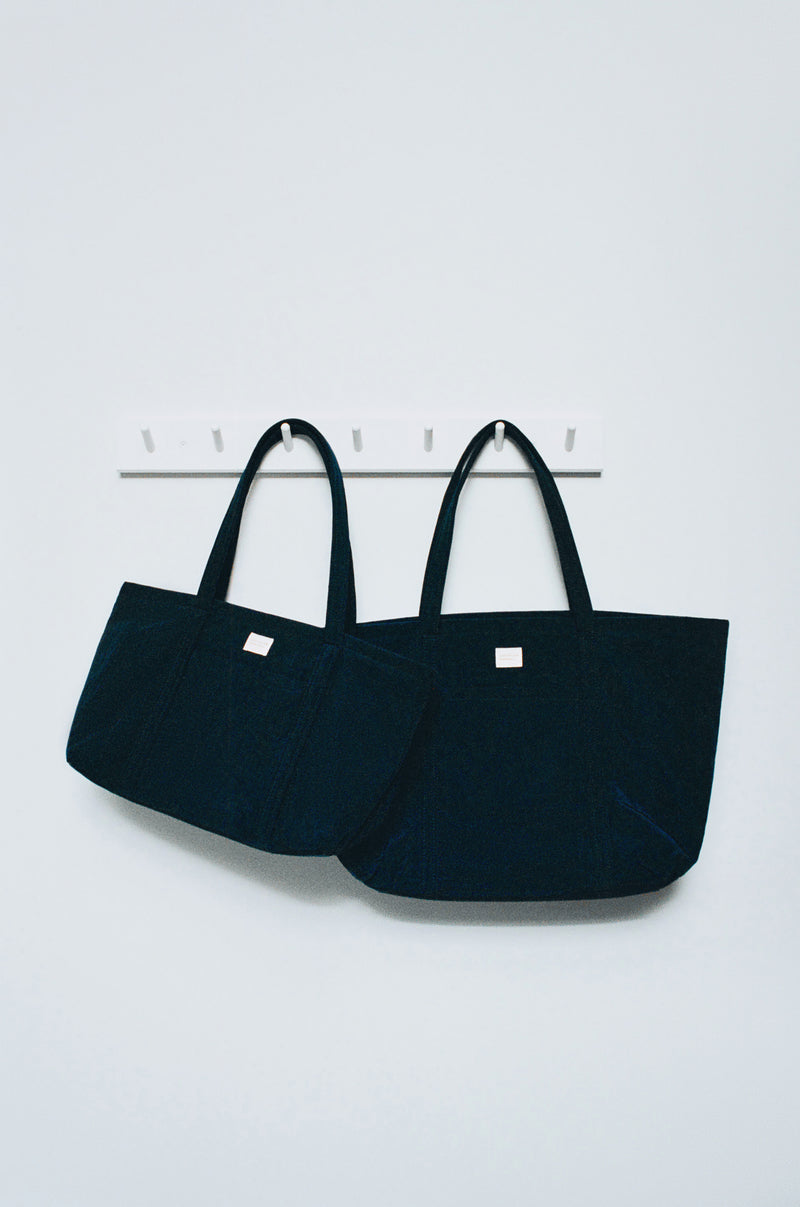 Mira Navy Everyday Tote in navy nylon and Dina Navy Travel Tote in navy nylon.