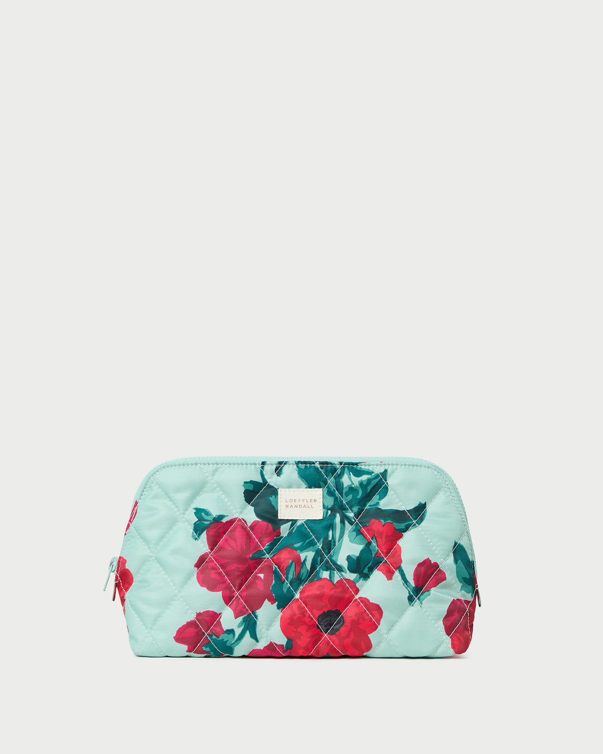 Frances Mint Floral Cosmetic Pouch in quilted mint floral nylon.