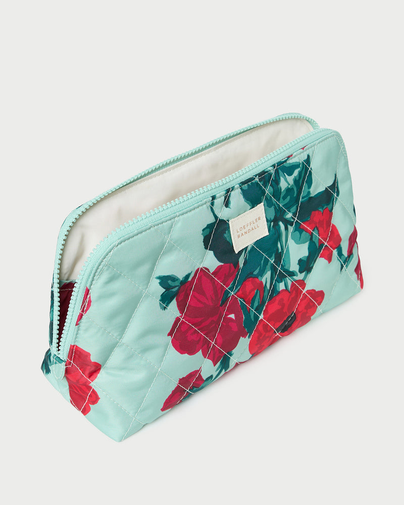 Frances Mint Floral Cosmetic Pouch in quilted mint floral nylon.