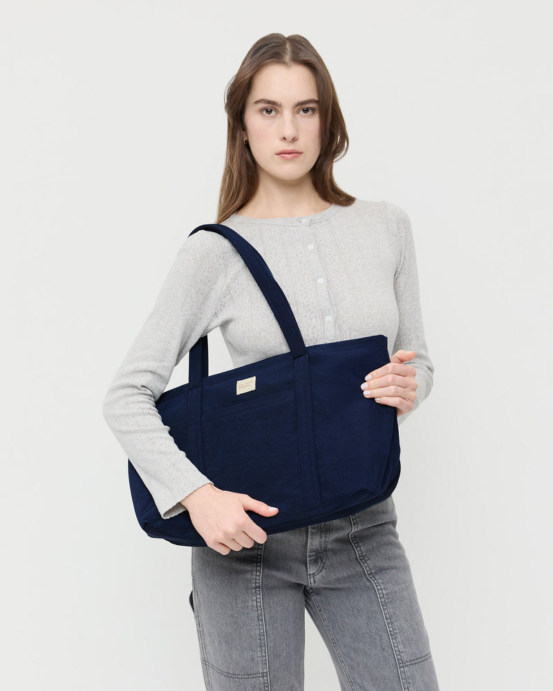 Mira Navy Everyday Tote Bag in navy water-resistant nylon.