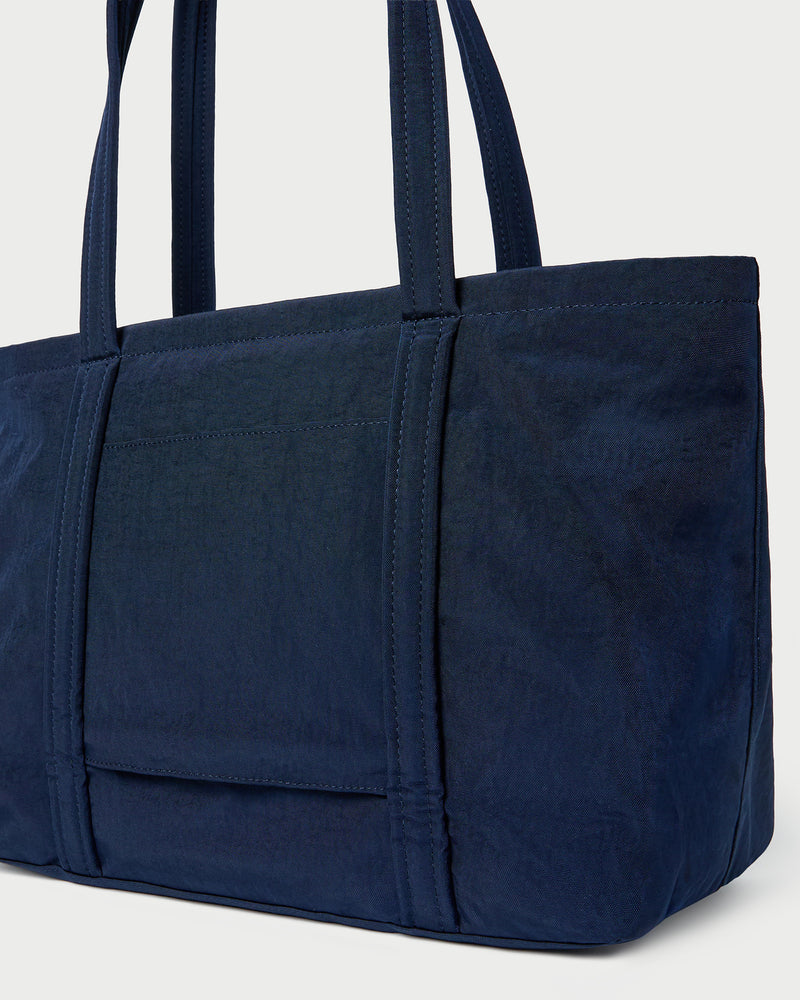 Mira Navy Everyday Tote Bag in navy water-resistant nylon.