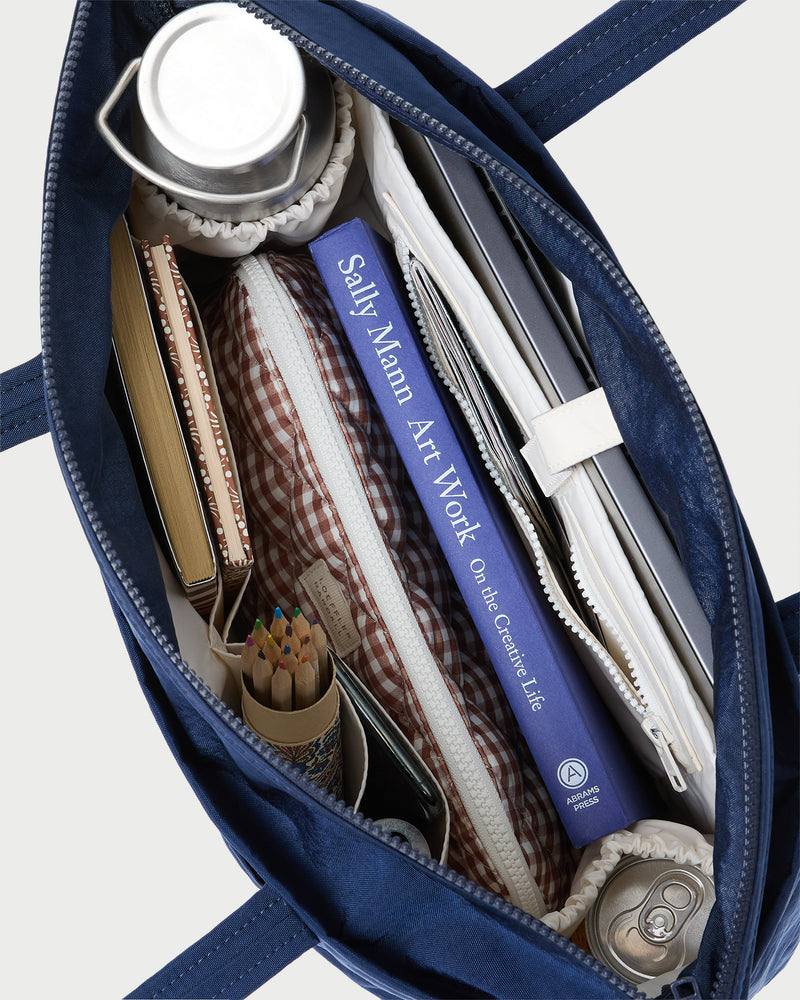 Mira Navy Everyday Tote Bag in navy water-resistant nylon.