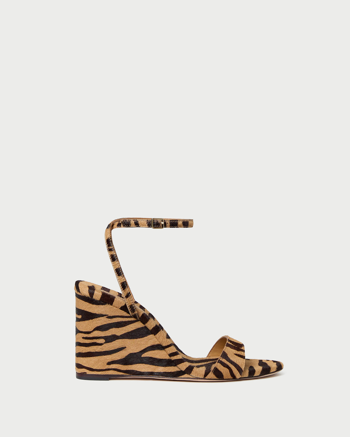 Gavi Wedge sandal in tan zebra print hair calf.