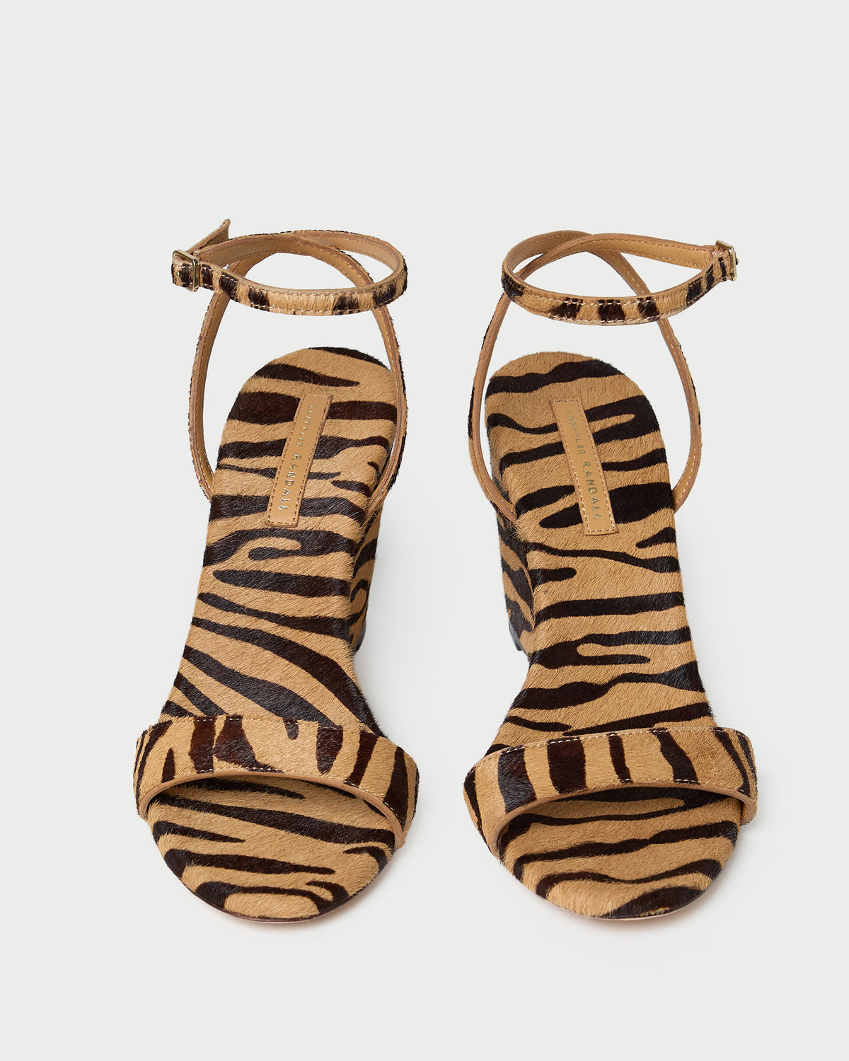 Gavi Wedge sandal in tan zebra print hair calf.