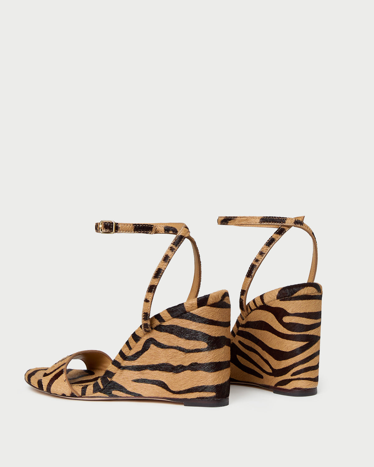 Gavi Wedge sandal in tan zebra print hair calf.
