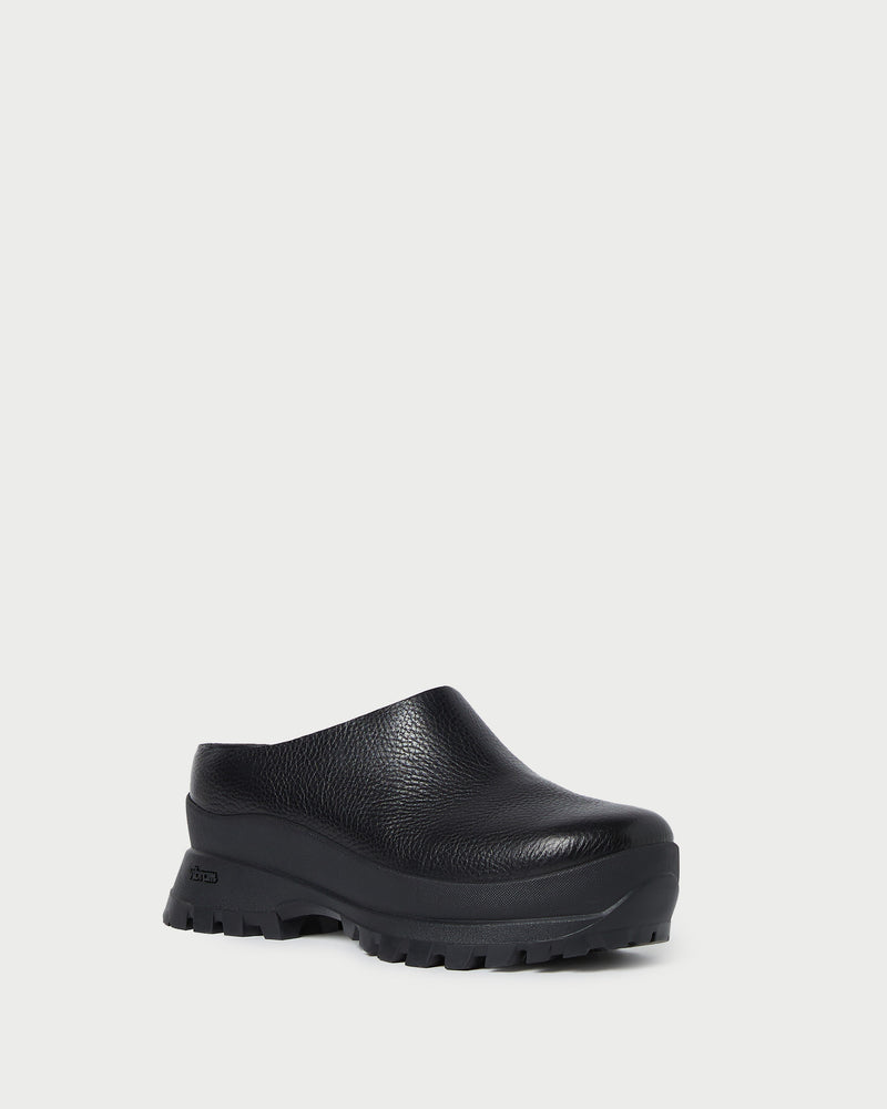 Gemma Black Leather Lug Mule in black pebbled leather.