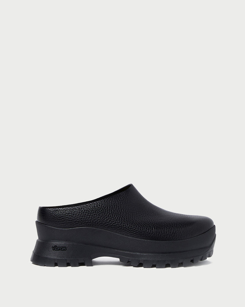 Gemma Black Leather Lug Mule in black pebbled leather.
