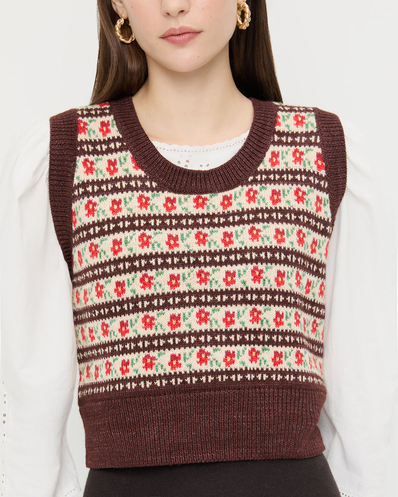 Heather Sweater Vest in brown and red intarsia floral, Felicity Blouse in cream cotton, and Tansy Suede Skirt in brown suede.
