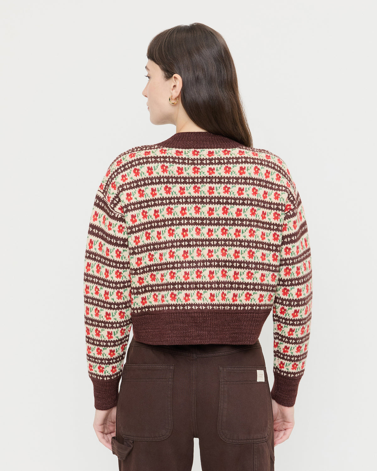 Idris Intarsia Cardigan in red and brown floral intarsia wool and Molly Workwear Jean in dark brown denim.