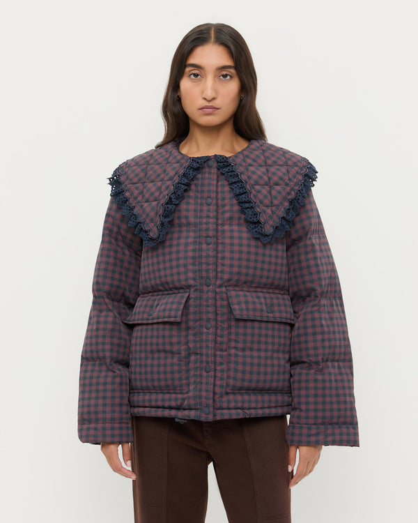 Jacob Puffer Jacket in brown and navy gingham nylon.