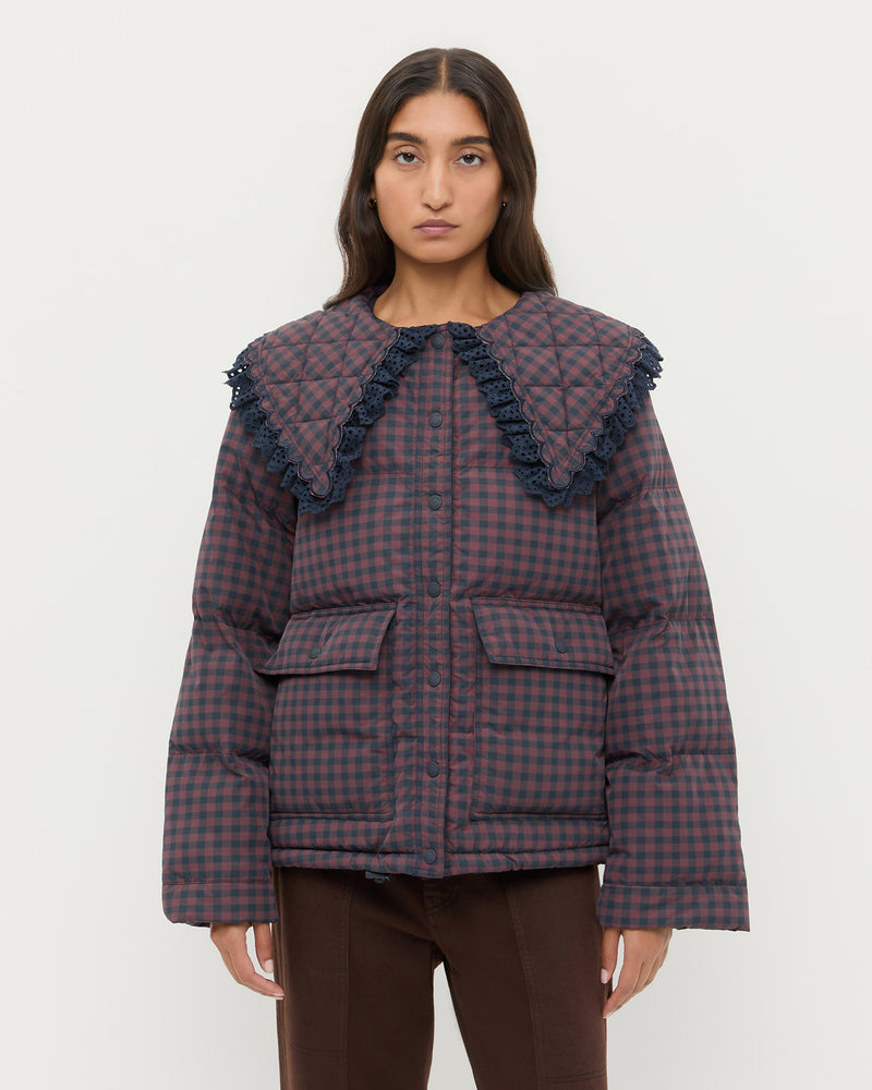 Jacob Puffer Jacket in brown and navy gingham nylon.