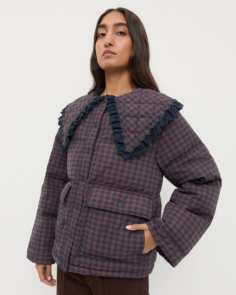 Jacob Puffer Jacket in brown and navy gingham nylon.