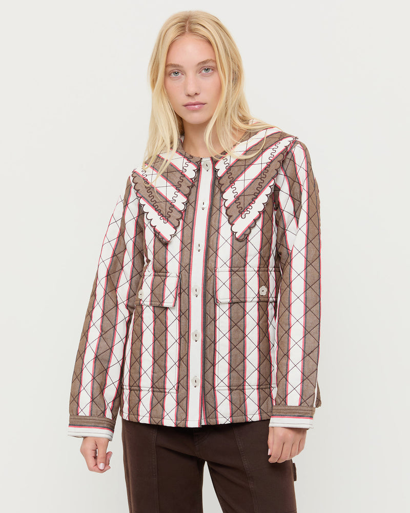 James Quilted Jacket in brown, cream, and red striped heavy quilted cotton-linen fabric, and Molly Workwear Jean in brown denim.