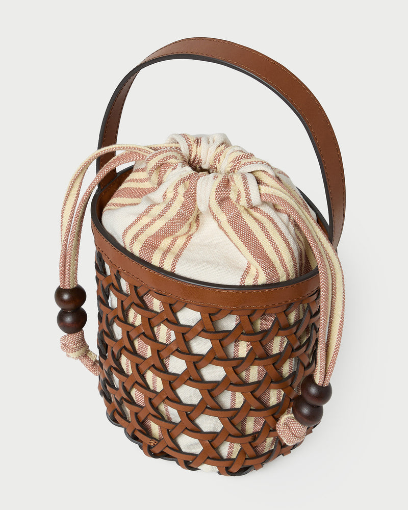 Laith Timber/Butter Bucket Bag with yellow and brown striped canvas and timber brown leather.