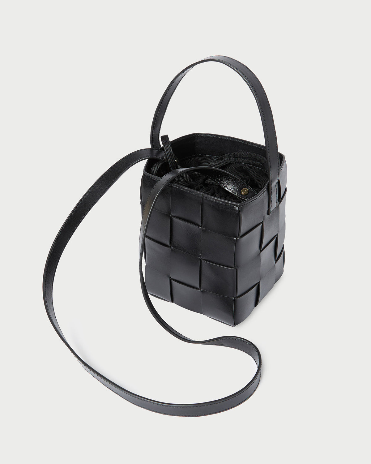 Laith Black Leather Bucket Bag in black woven leather.