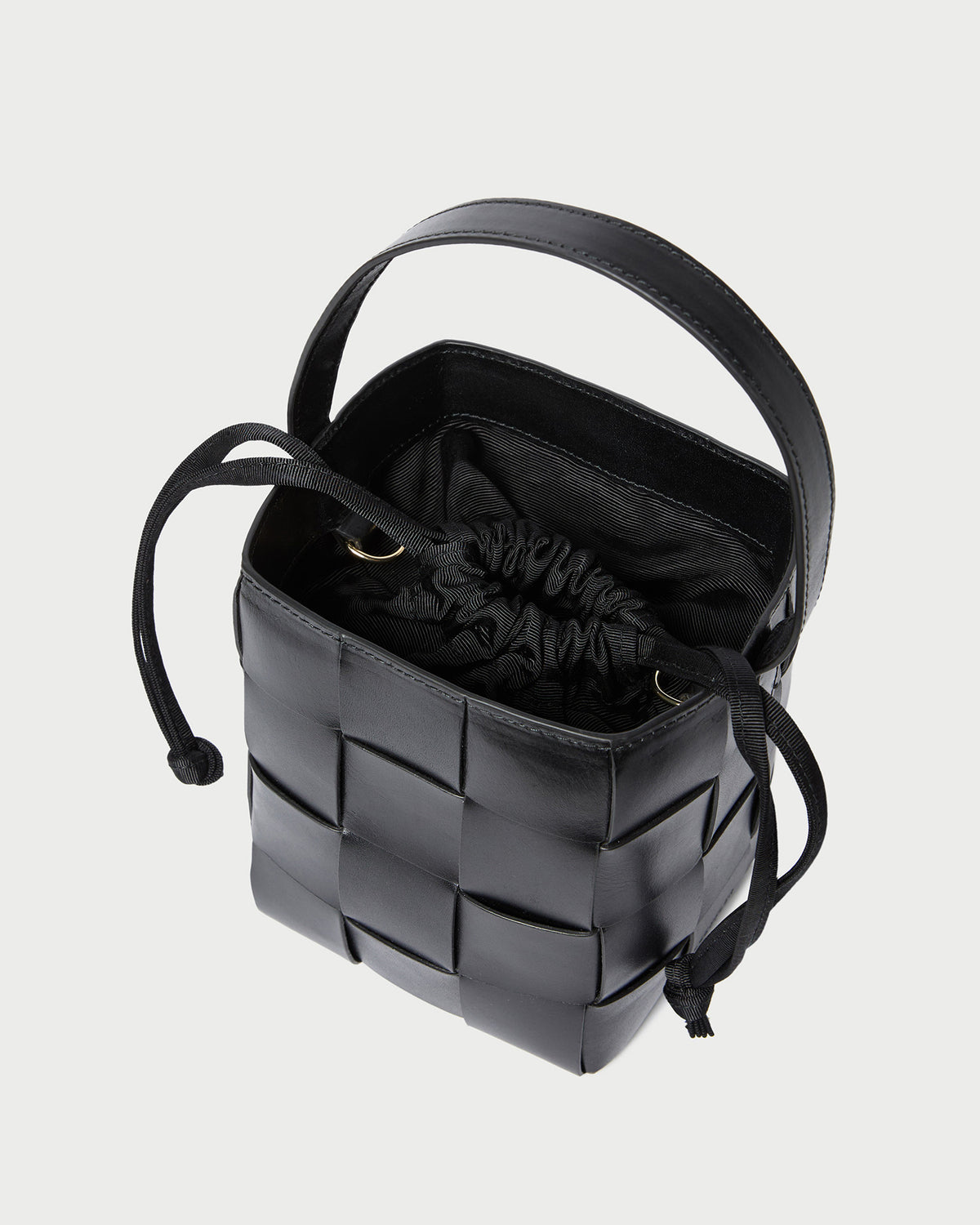 Laith Black Leather Bucket Bag in black woven leather.