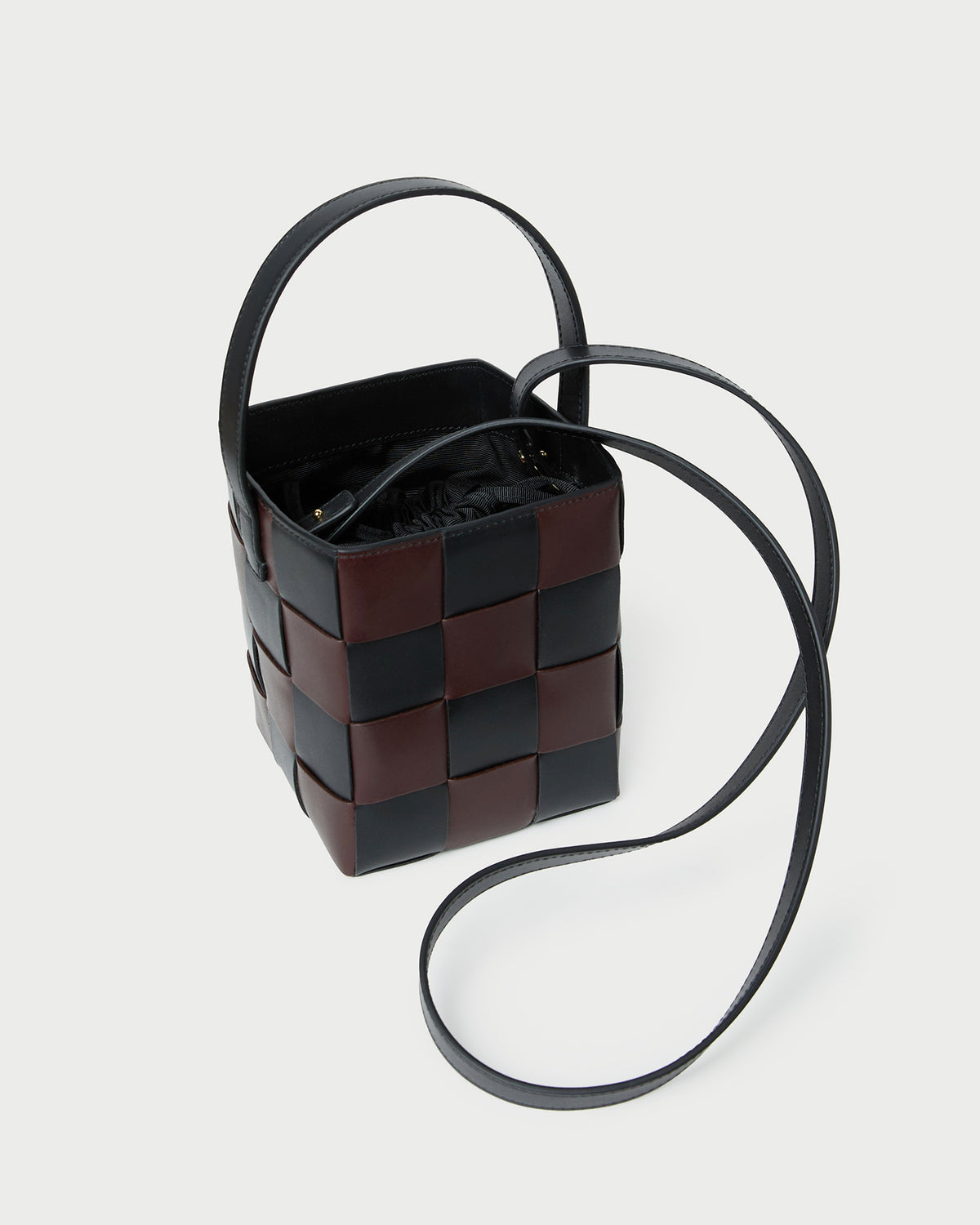 Laith Black/Brown Woven Bucket Bag in brown and black woven leather.