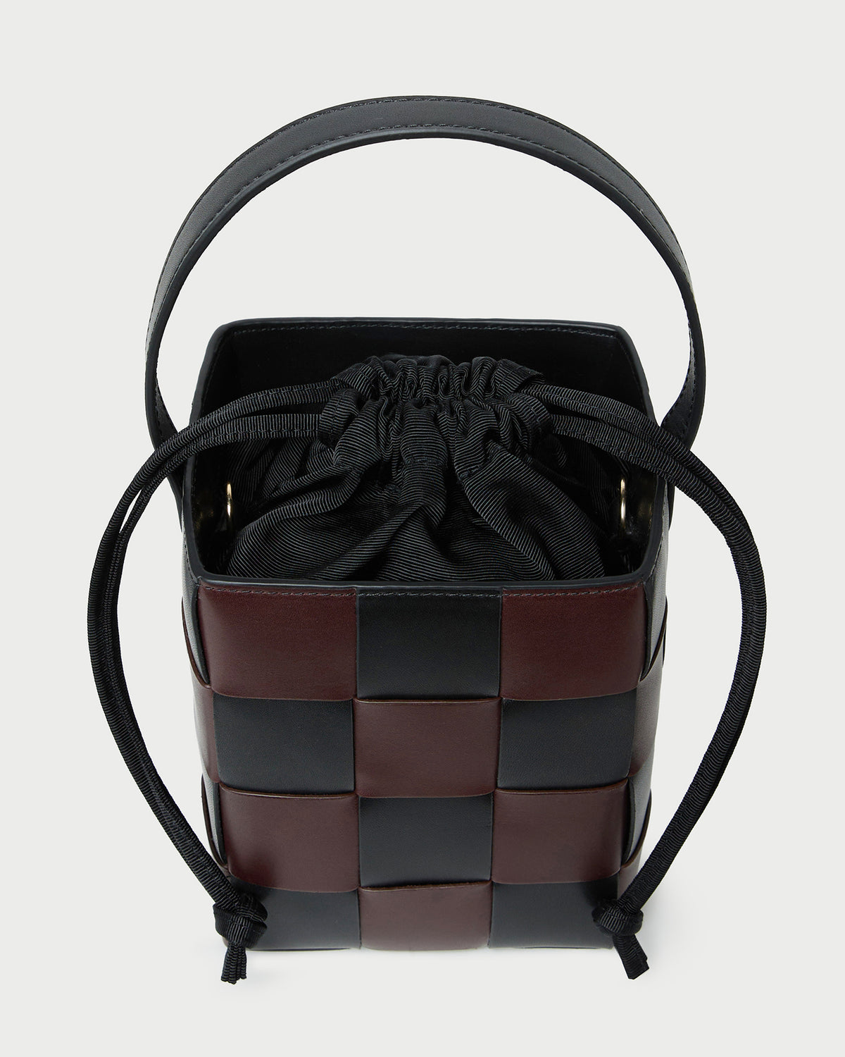 Laith Black/Brown Woven Bucket Bag in brown and black woven leather.