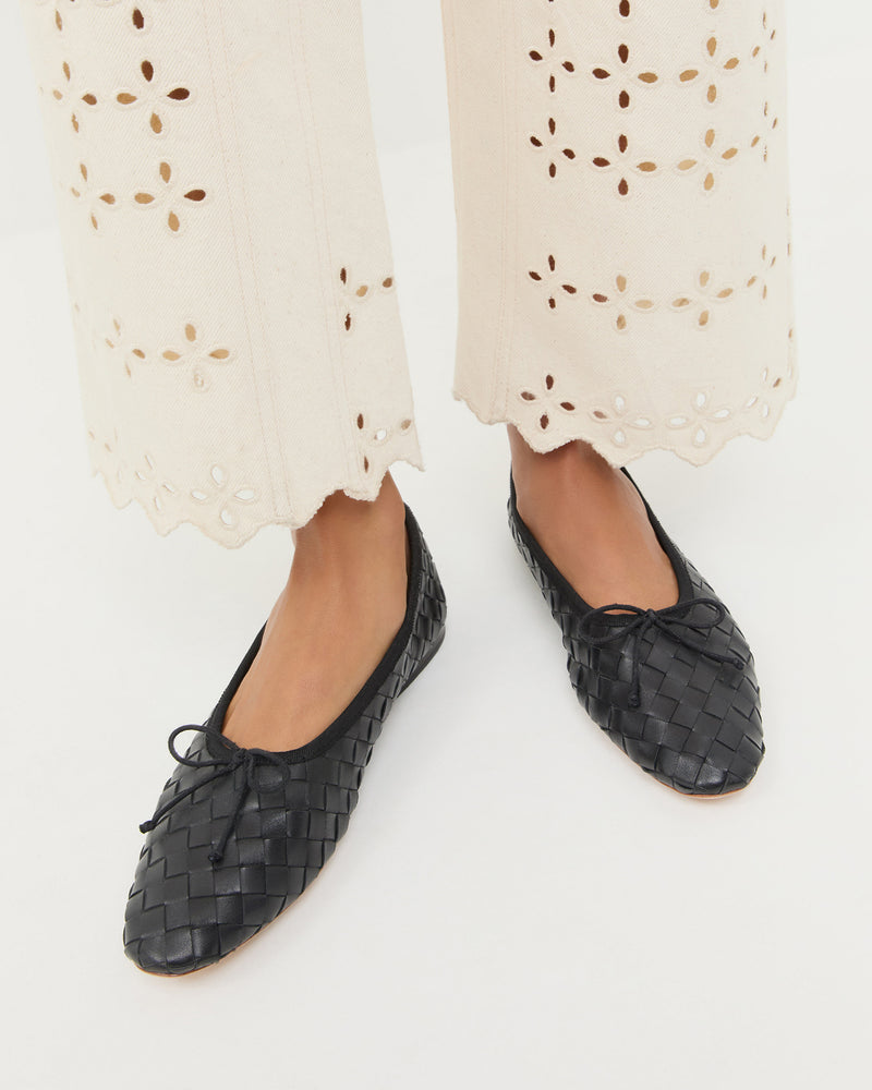 Landry Black Woven Ballet Flat in black woven leather and Demi Embroidered Pant in natural cotton.