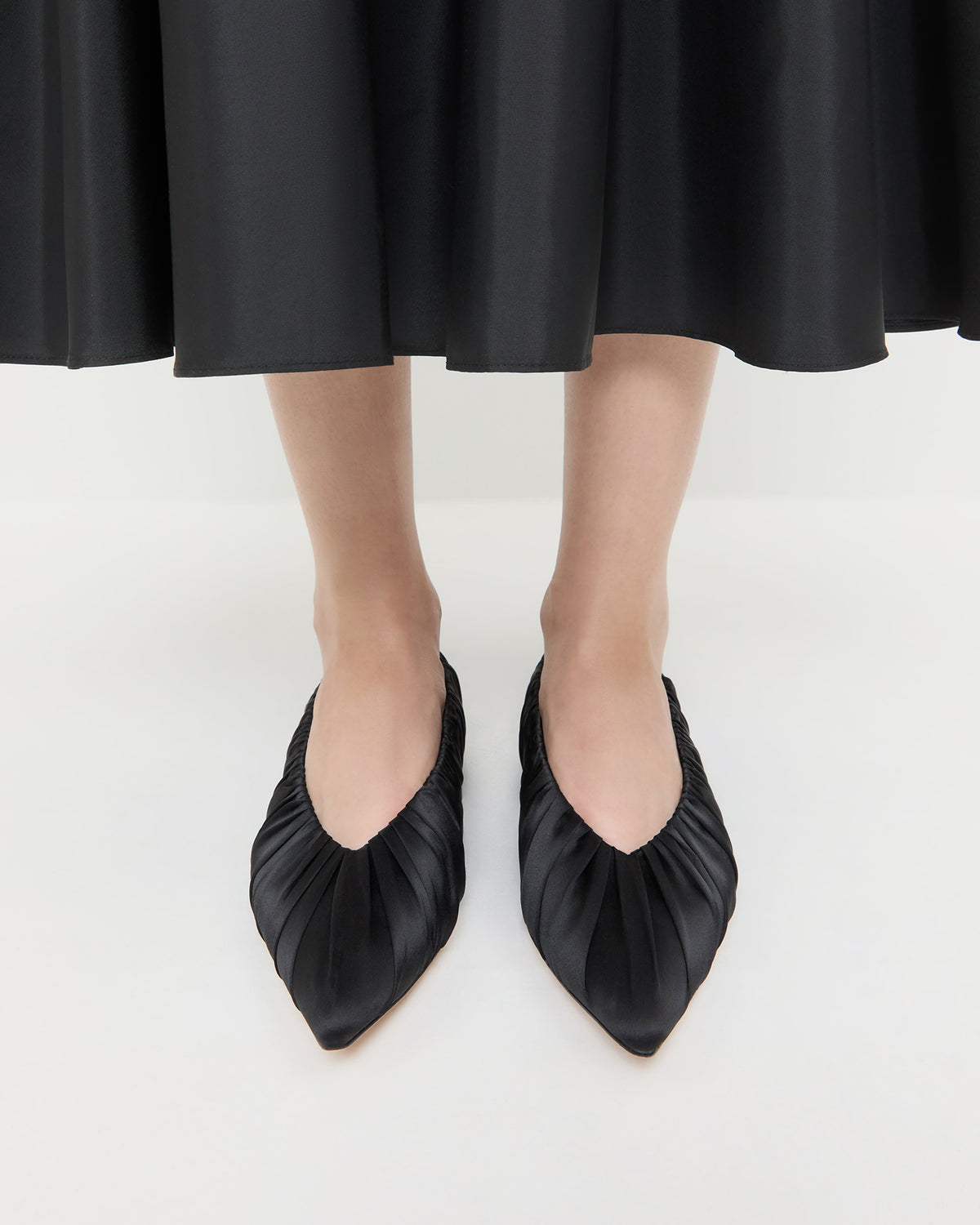Lane Black Satin Ballet Flat in black satin and Sora Skirt in black taffeta.