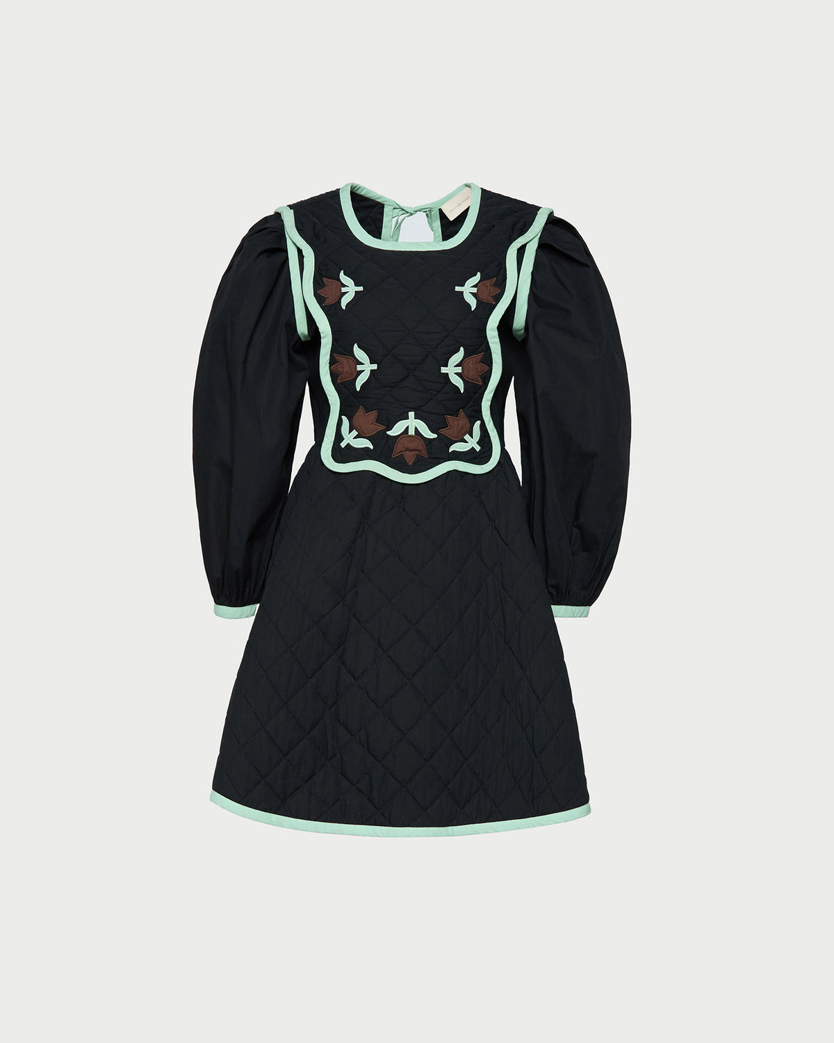Laney Short Dress in quilted black cotton with mint and brown floral design.
