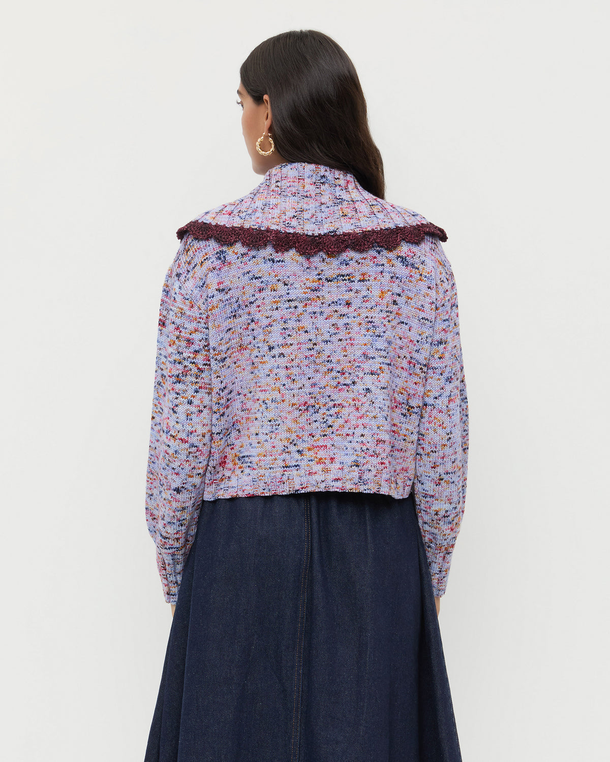 Lo Cardigan in marble maroon wool and Ruthie Denim Skirt in dark blue.
