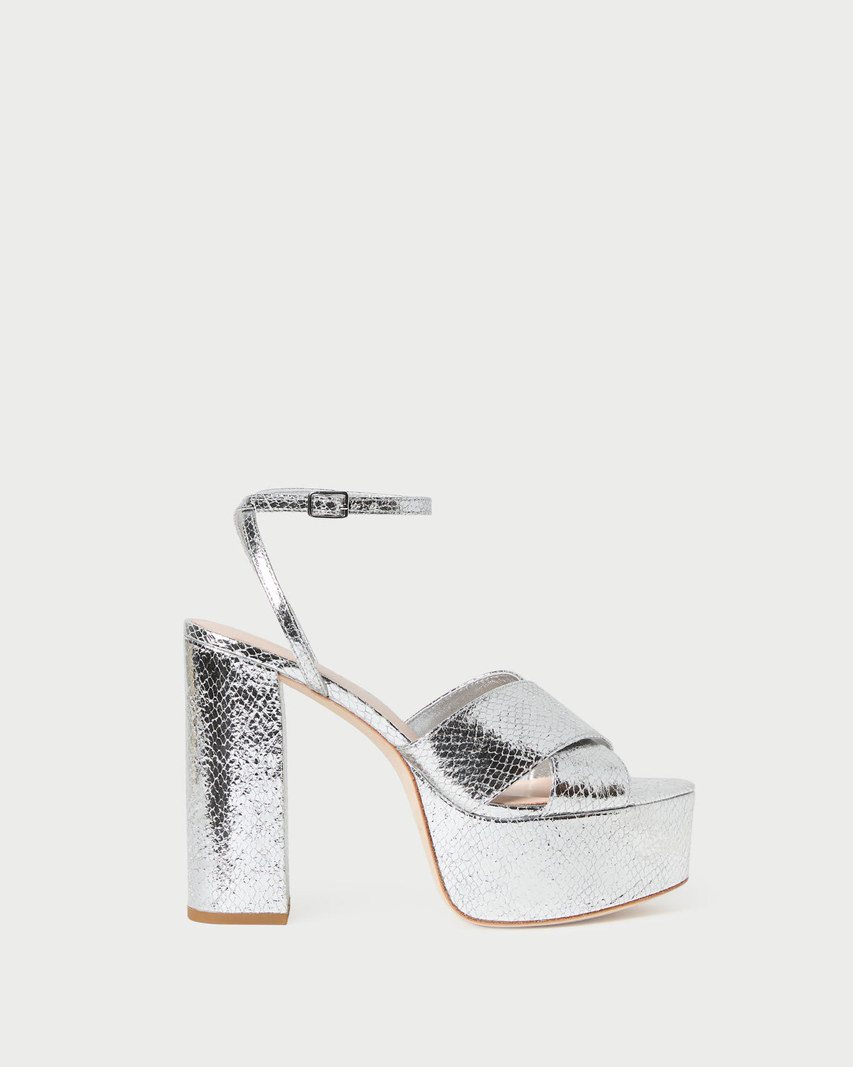 Loretta Silver Snake Platform Sandal in silver snake embossed leather.