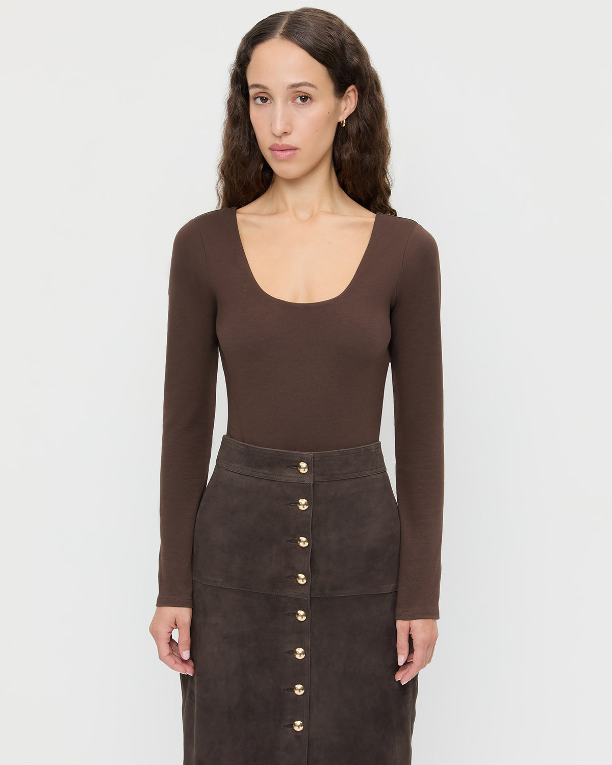 Lumi Long-Sleeve Bodysuit in chocolate brown jersey fabric and Tansy Suede Skirt in brown suede.