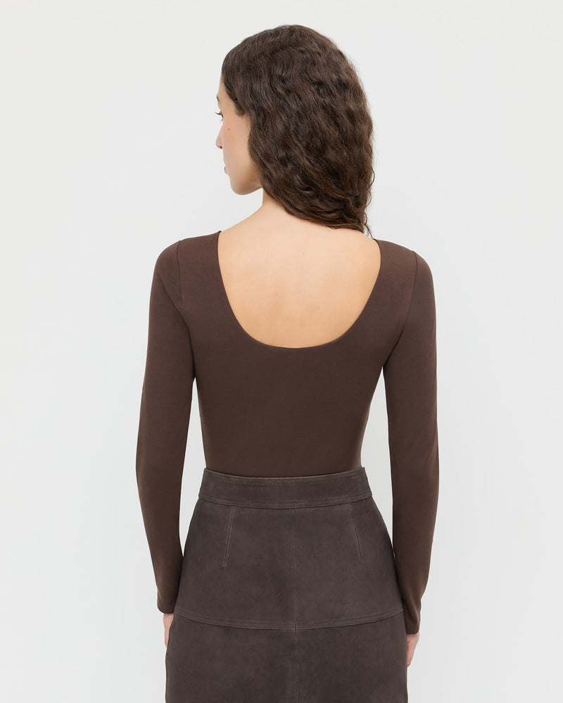 Lumi Long-Sleeve Bodysuit in chocolate brown jersey fabric and Tansy Suede Skirt in brown suede.