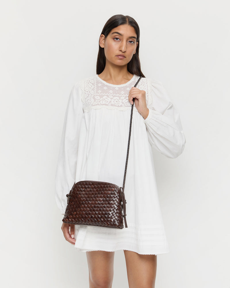 Mallory Chocolate Woven Leather Crossbody in brown chocolate woven leather and Brenna Dress.