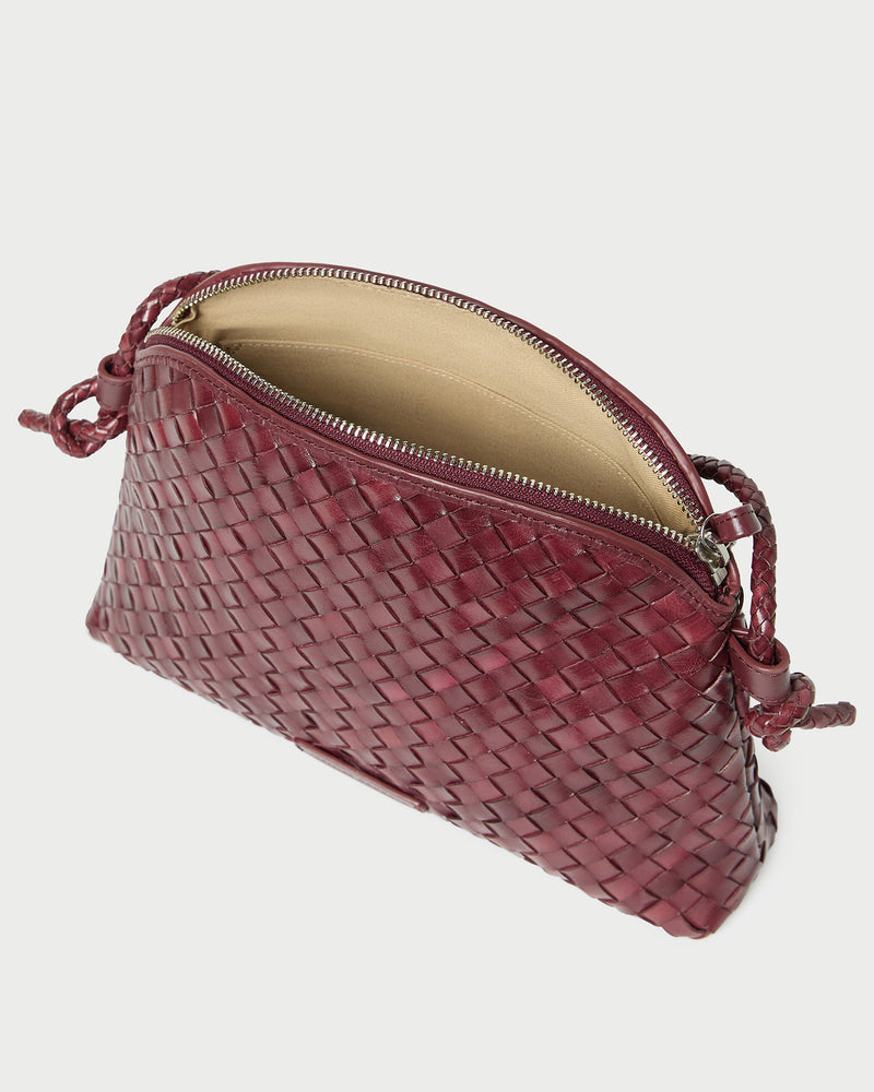 Mallory Maroon Woven Leather Crossbody in maroon woven leather.