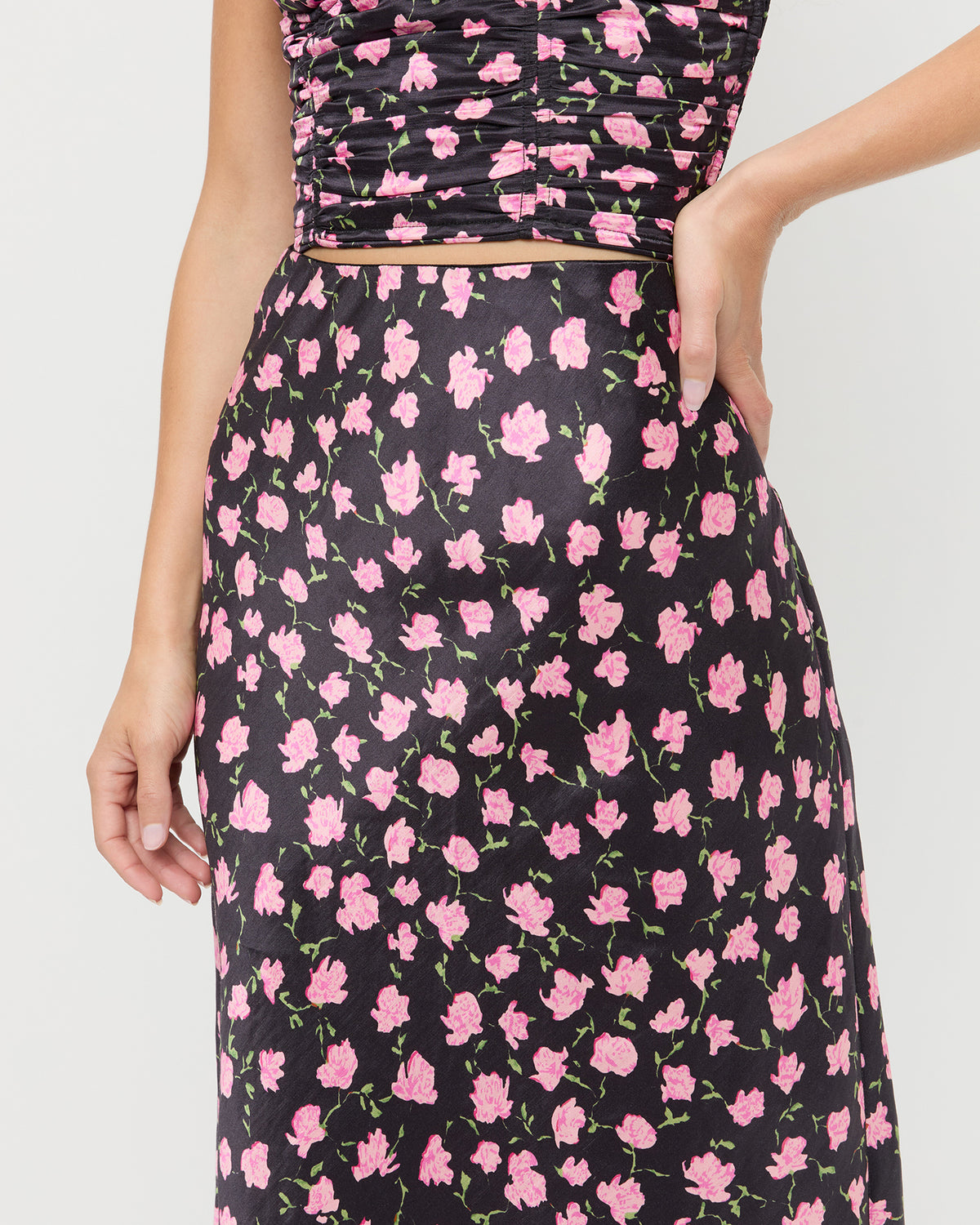 Mandy Midi Skirt in black rosette textured fabric and Cresta Top in black rosette textured fabric.