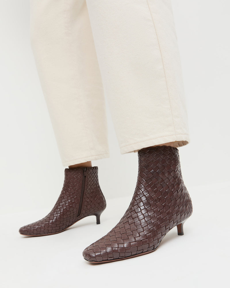 Marcella Espresso Woven Ankle Boot in espresso brown woven leather and Winona Denim Pant in natural denim.