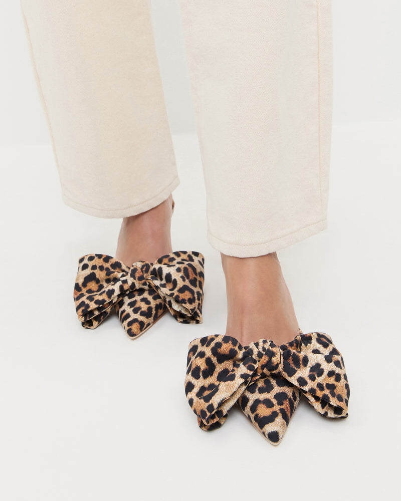 Margot Leopard Jersey Bow Mule in leopard print jersey and Winona Denim Barrel Pant in natural.