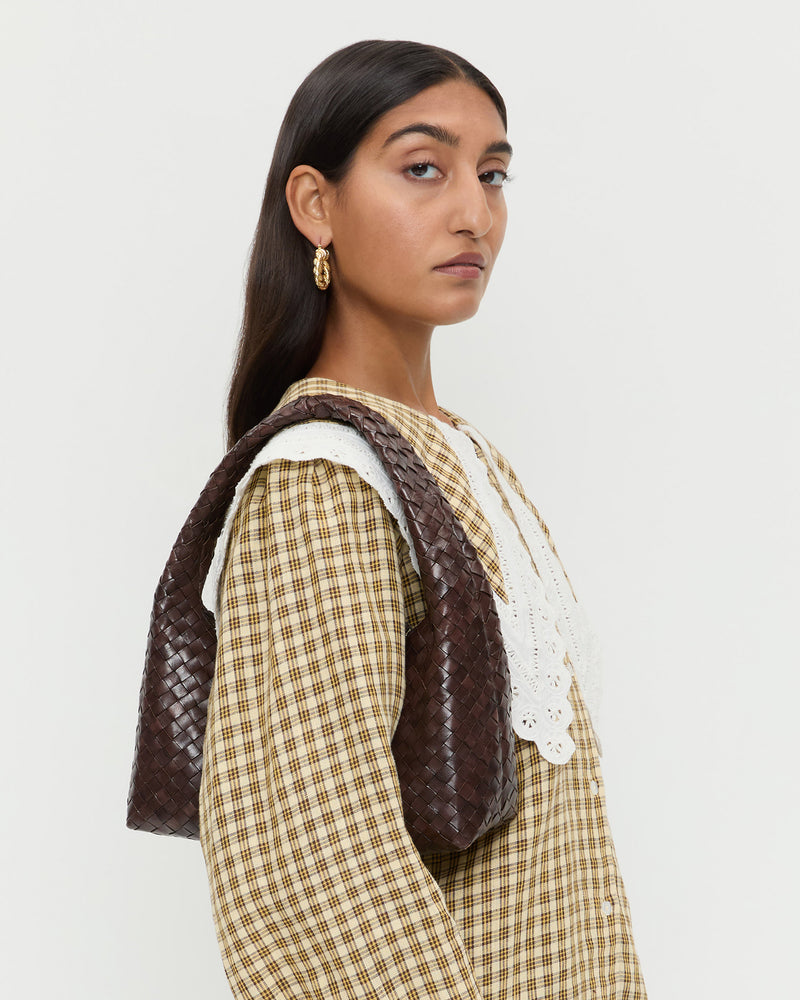 Mercer Chocolate Woven Shoulder Bag in brown chocolate woven leather and Ken Shirt in brown plaid.
