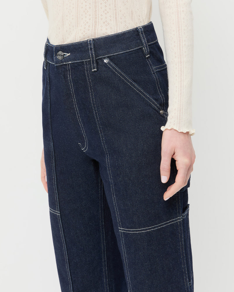 Molly Workwear Jean in dark blue denim and Lolo Pointelle Long-Sleeve Tee in cream cotton.