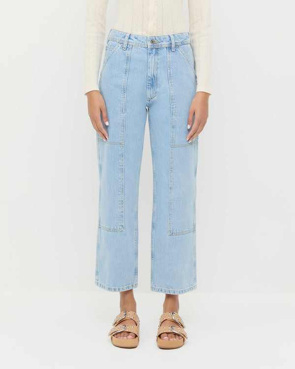 Molly Workwear Jean in light blue denim, Ash Pointelle Cardigan in cream cotton, and Joni Khaki Studded Sandal.