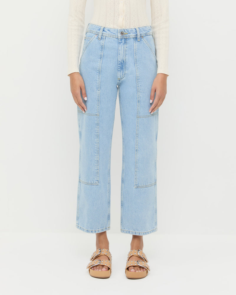 Molly Workwear Jean in light blue denim, Ash Pointelle Cardigan in cream cotton, and Joni Khaki Studded Sandal.