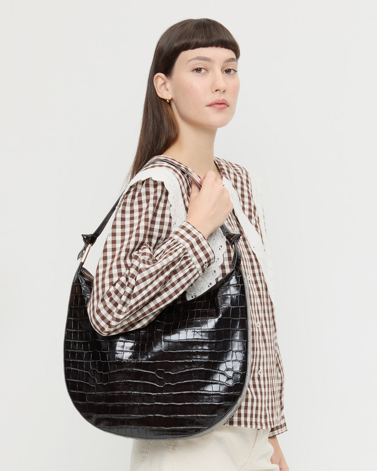 Morgan Crocodile Leather Shoulder Bag in crocodile black leather, Ken Shirt in brown and cream cotton, Winona Denim Pant in natural denim.