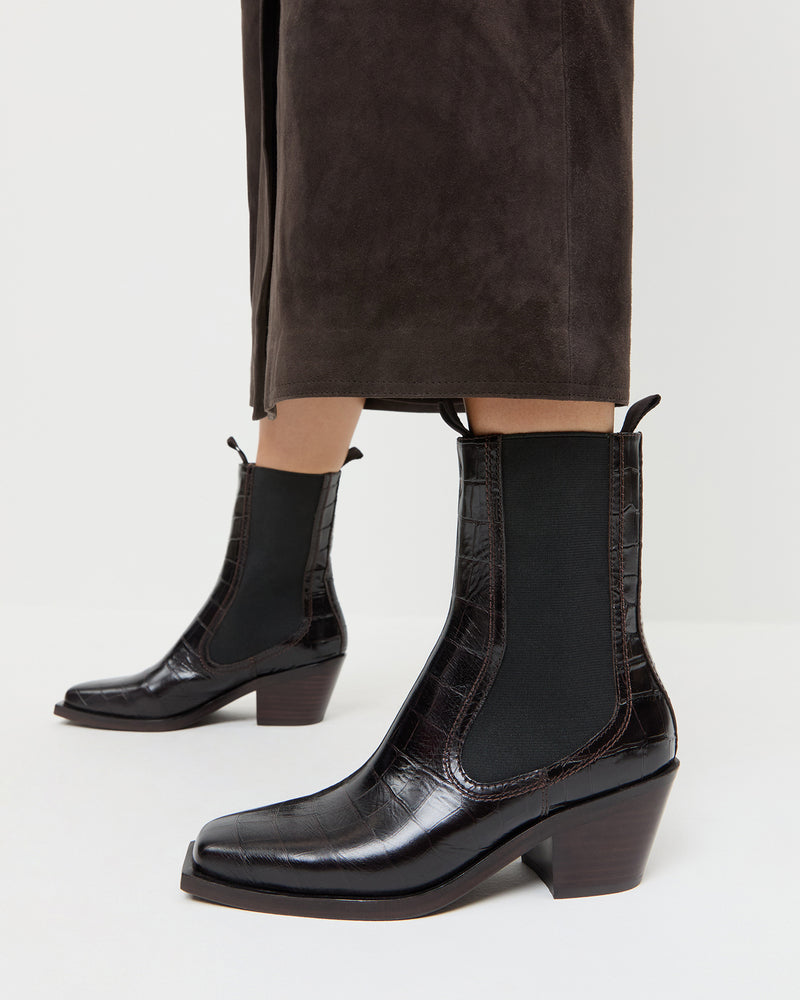 Nat Crocodile Leather Ankle Boot in crocodile black leather and Tansy Suede Skirt in brown suede.