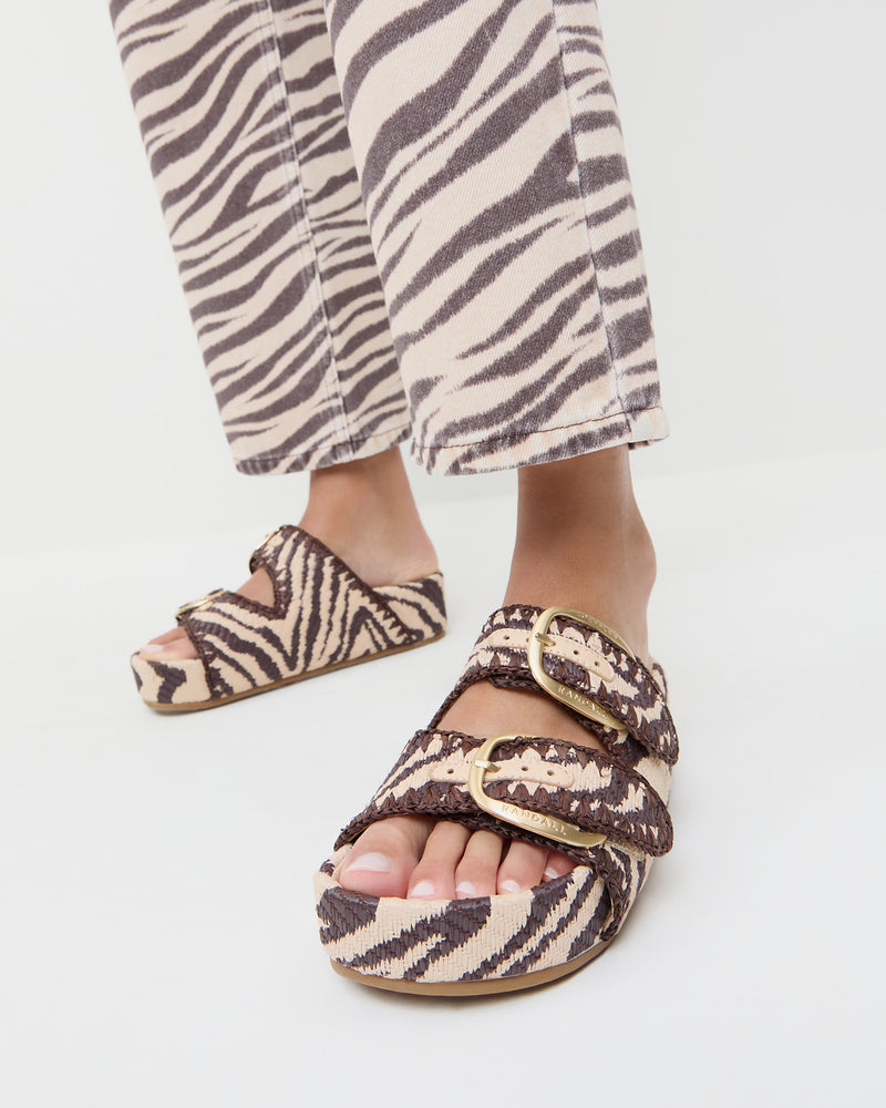 Nico Zebra Two-Band Sandal in zebra print woven cotton fabric and Winona Denim Pant in zebra print denim.