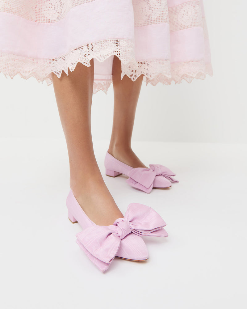 Noa Pink Moiré Bow Flat in powder pink moiré.